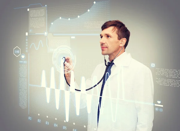 Male doctor with stethoscope and cardiogram — Stock Photo, Image