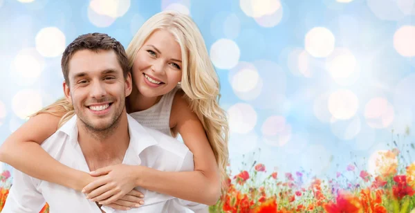 Happy couple having fun over natural background — Stock Photo, Image