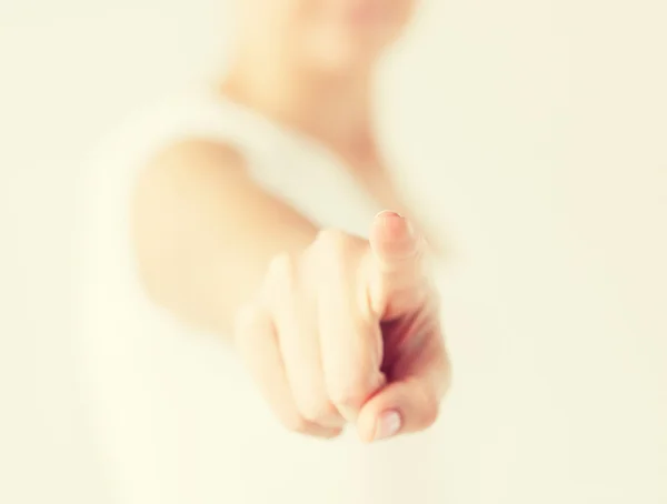 Woman pointing her finger at you — Stock Photo, Image