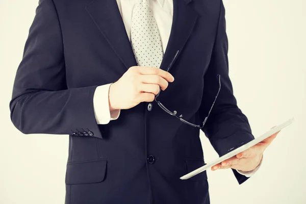 Man with tablet pc and eyeglasses — Stock Photo, Image