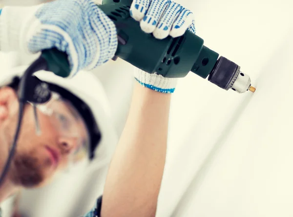 Man drilling the wall — Stock Photo, Image