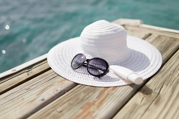 Close up of beach accessories at seaside — Stock Photo, Image