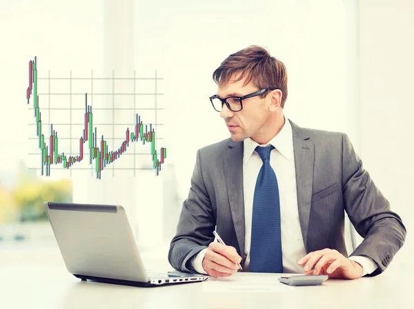 Businessman with computer, papers and calculator — Stock Photo, Image