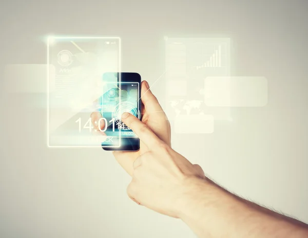 Man hand med smartphone och virtuella skärmen — Stockfoto
