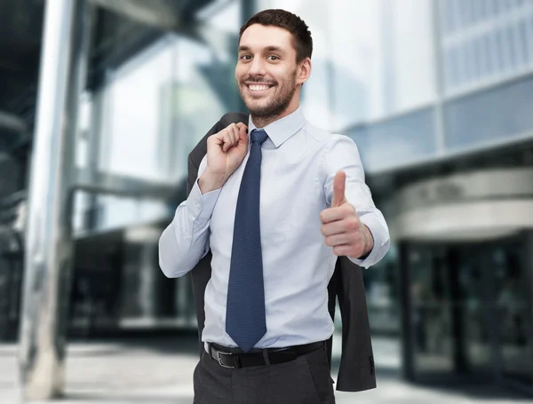 Bello buisnessman con giacca sopra la spalla — Foto Stock