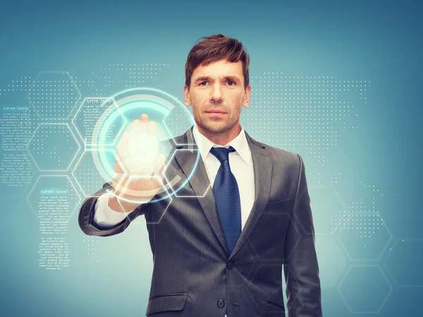 Attractive buisnessman working with virtual screen — Stock Photo, Image