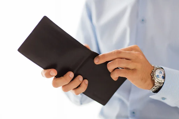 Close up of businessman hands holding open wallet — Stock Photo, Image