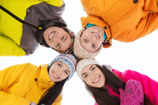 Happy friends in winter clothes outdoors — Stock Photo, Image