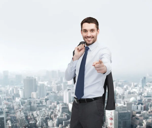 Handsome buisnessman with jacket over shoulder — Stock Photo, Image