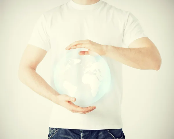 Man hands holding sphere globe — Stock Photo, Image