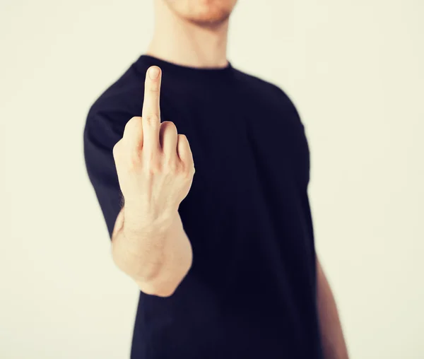 Man showing middle finger — Stock Photo, Image