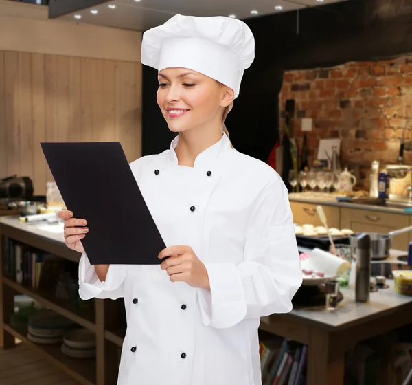 Female chef with  blank paper — Stock Photo, Image