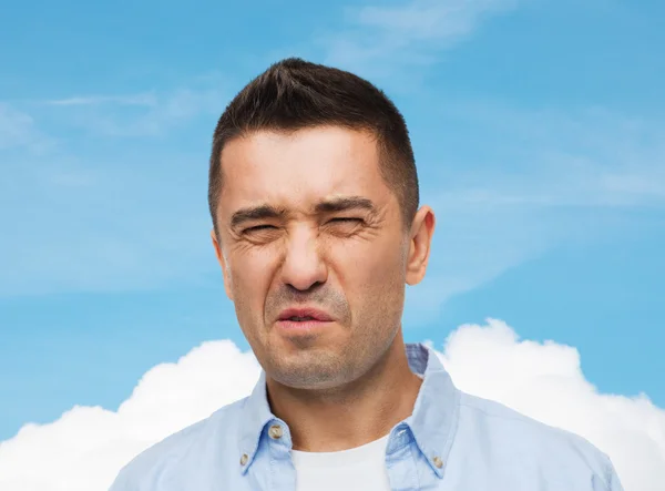 Man dislikes  unpleasant smell — Stock Photo, Image