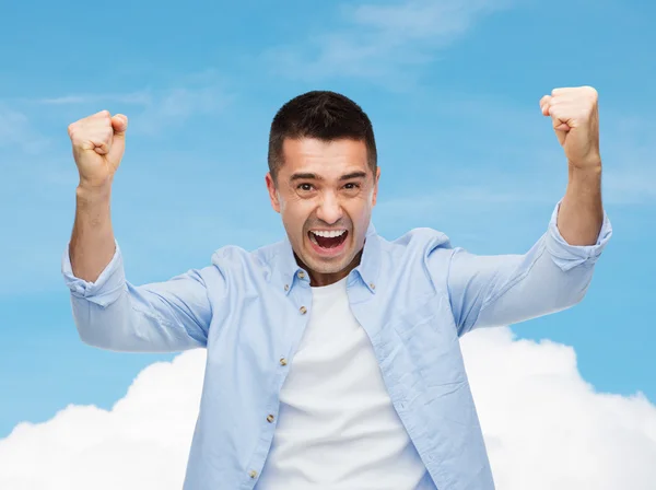 Hombre feliz con las manos levantadas — Foto de Stock