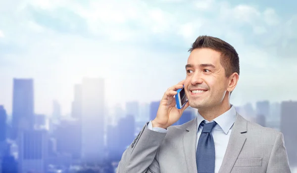 Businessman calling on smartphone — Stock Photo, Image