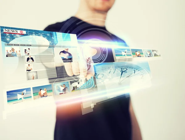 Man pressing button on virtual screen — Stock Photo, Image