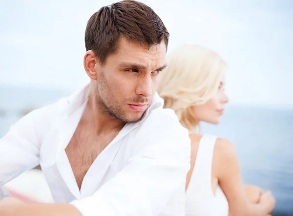 Stressed man with woman outside — Stock Photo, Image