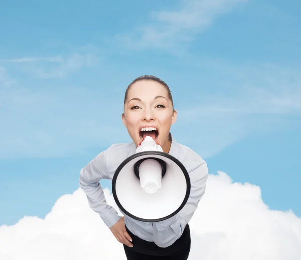 Screaming businesswoman with megaphone — Stock Photo, Image