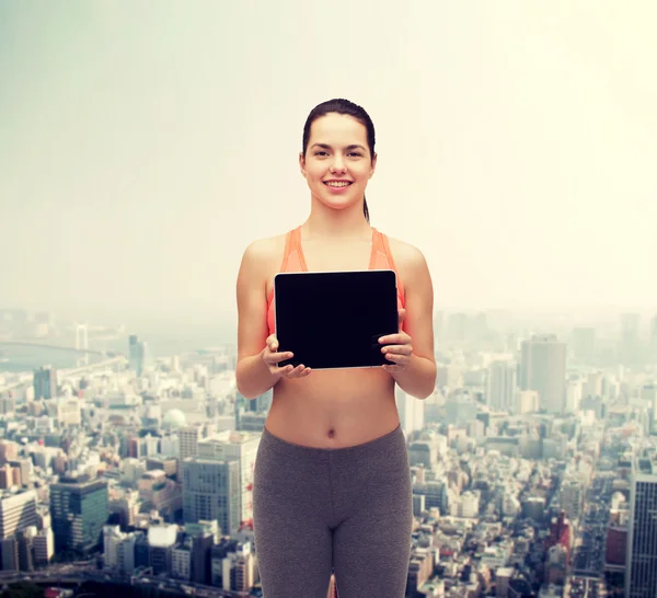 Deportiva mujer con tablet PC pantalla en blanco —  Fotos de Stock