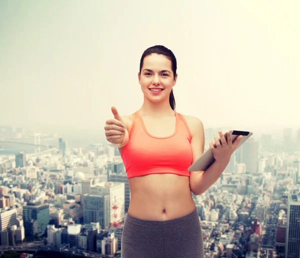 Mulher desportiva com computador tablet pc — Fotografia de Stock