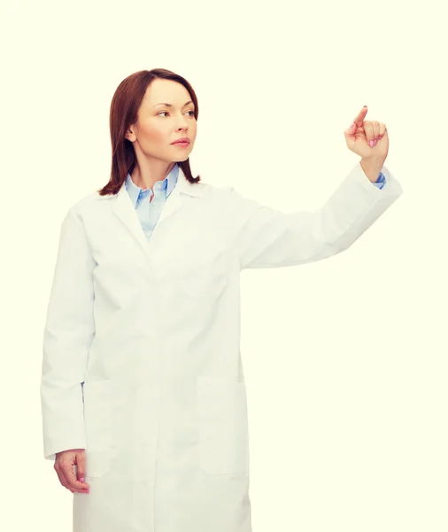 Doctor pointing to something or pressing button — Stock Photo, Image