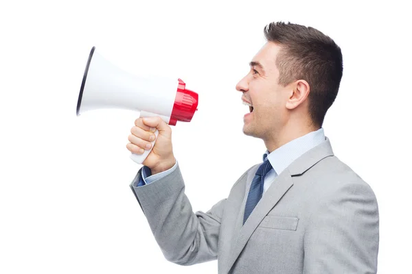 Empresário feliz em terno falando com megafone — Fotografia de Stock