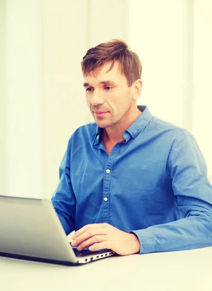 Man working with laptop at home — Stock Photo, Image