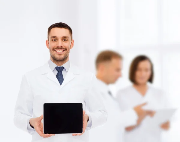Smiling male doctor with tablet pc — Stock Photo, Image