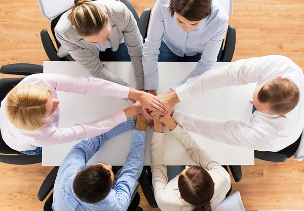 Close up of business team with hands on top — Stock Photo, Image