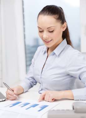 businesswoman with phone, laptop and files clipart