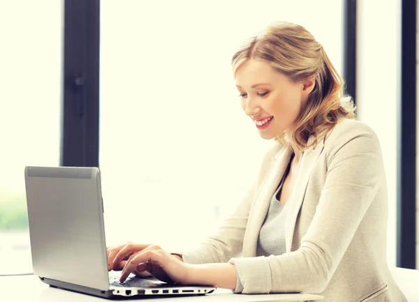 Happy woman with laptop computer — Stock Photo, Image