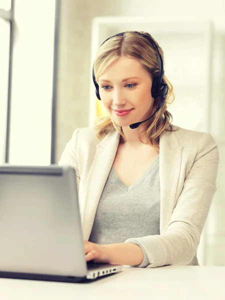 Helpline operator with laptop computer — Stock Photo, Image