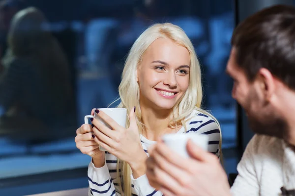 Happy couple meeting and drinking tea or coffee — Stock Photo, Image