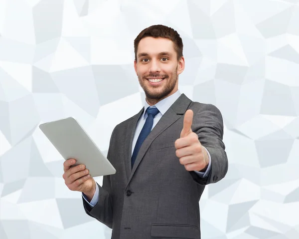 Uomo d'affari sorridente con computer tablet pc — Foto Stock