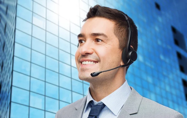 Smiling businessman in headset Royalty Free Stock Images