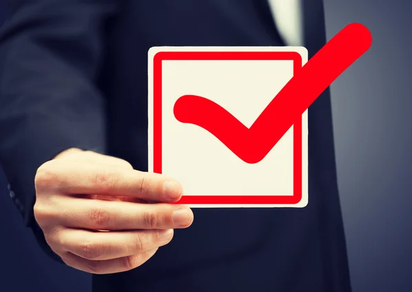 Closeup of checkbox and red mark in it — Stock Photo, Image