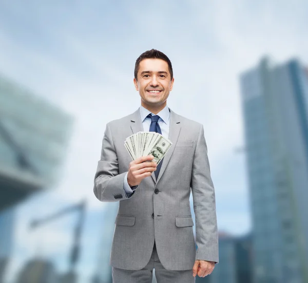Smiling businessman with american dollar money — Stock Photo, Image