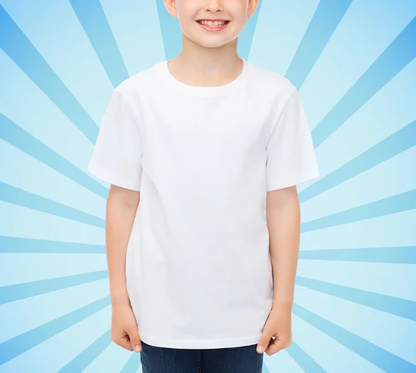 Smiling little boy in white blank t-shirt — Stock Photo, Image