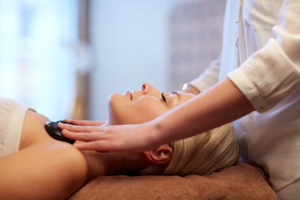 Close up of woman having hot stone massage in spa — Stock Photo, Image