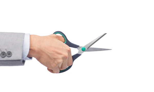 Zbliżenie biznesmen ręki trzymającej nożyczki — Zdjęcie stockowe