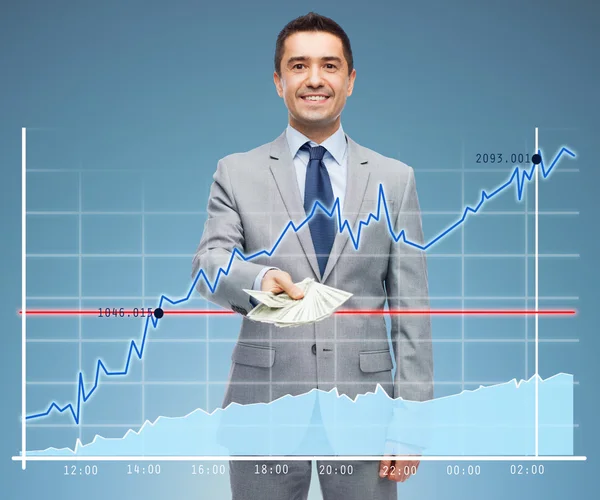 Homem de negócios sorridente com dinheiro dólar — Fotografia de Stock