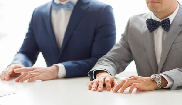 Close up of happy male gay couple hands on wedding — Stock Photo, Image