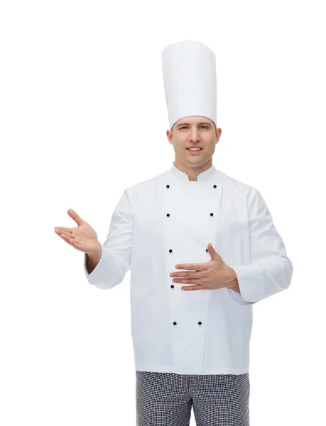 Happy male chef cook inviting — Stock Photo, Image