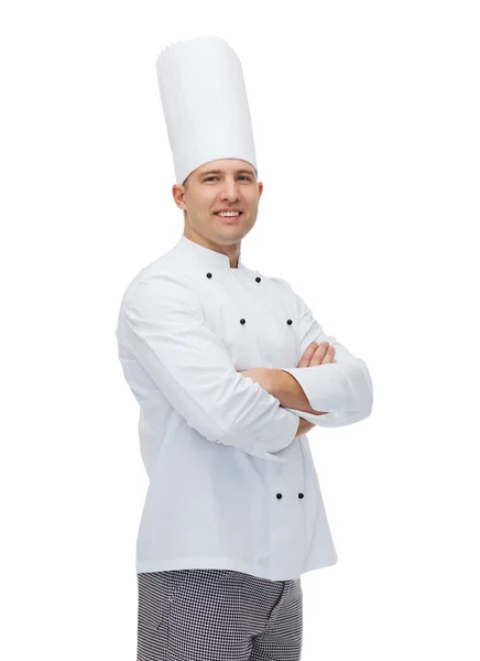 Mutlu erkek aşçı yemek ile çapraz eller — Stok fotoğraf