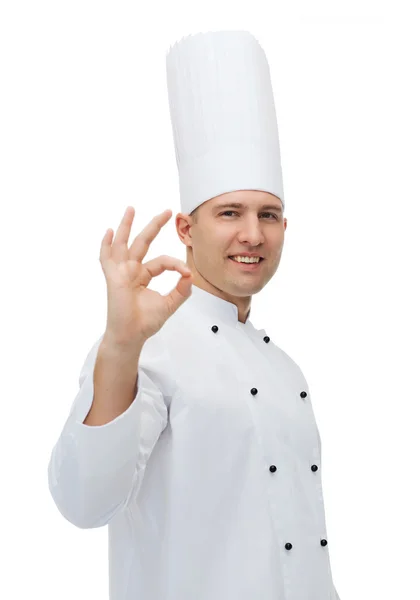Happy male chef cook showing ok sign Royalty Free Stock Images