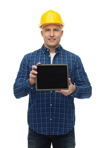 Sorridente construtor masculino no capacete com tablet pc — Fotografia de Stock