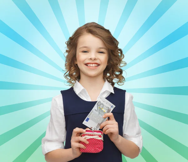 Gelukkig meisje met handtas en papiergeld — Stockfoto