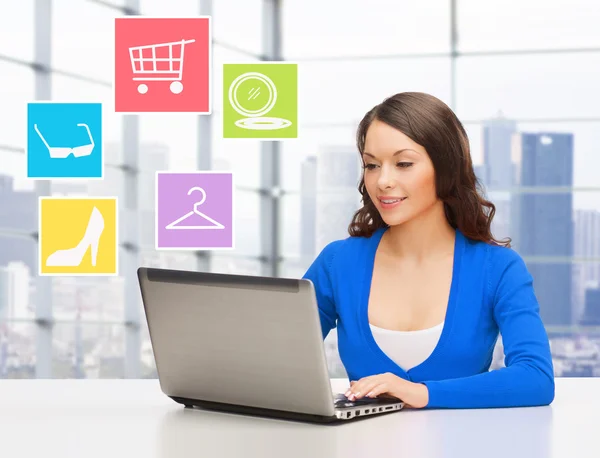 Smiling businesswoman or student with laptop — Stock Photo, Image