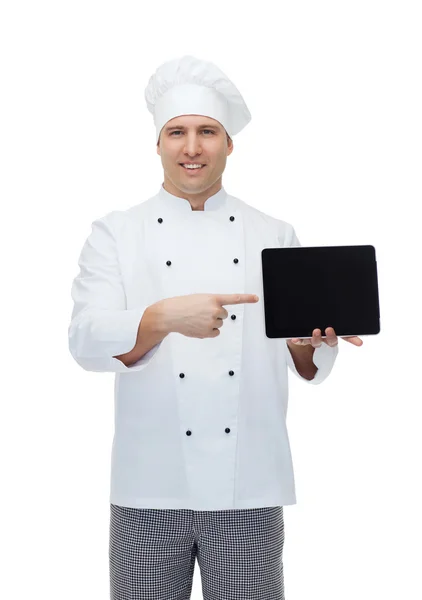 Cozinheiro chef masculino feliz mostrando com tablet pc — Fotografia de Stock