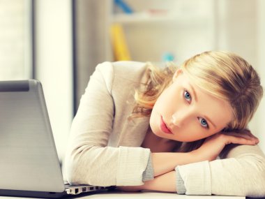 tired woman with laptop computer clipart